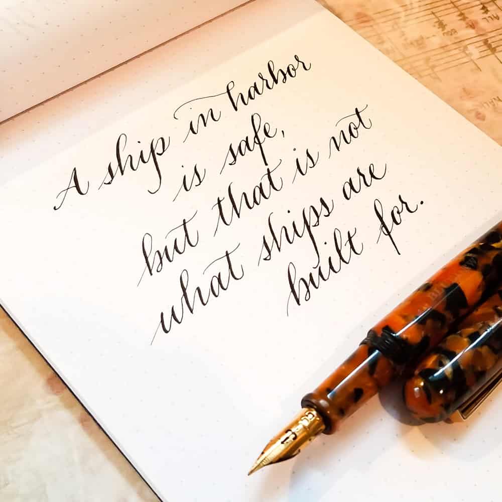 quote written in modern calligraphy