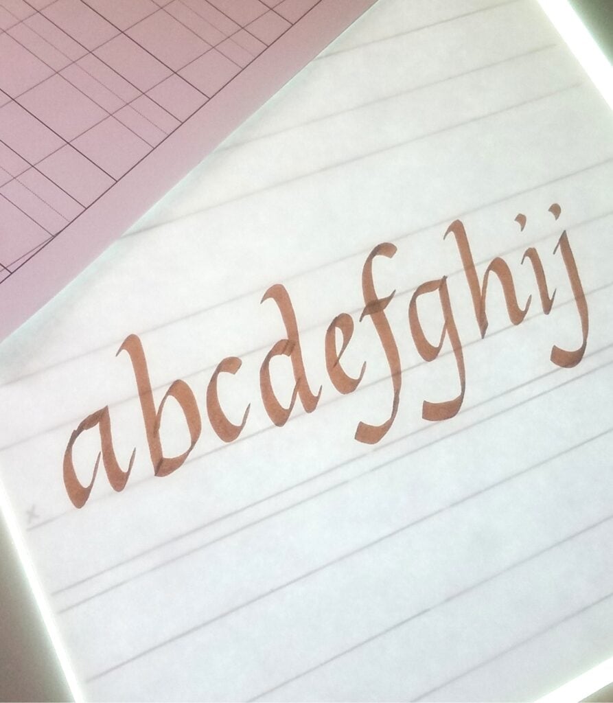 italic calligraphy with a light box